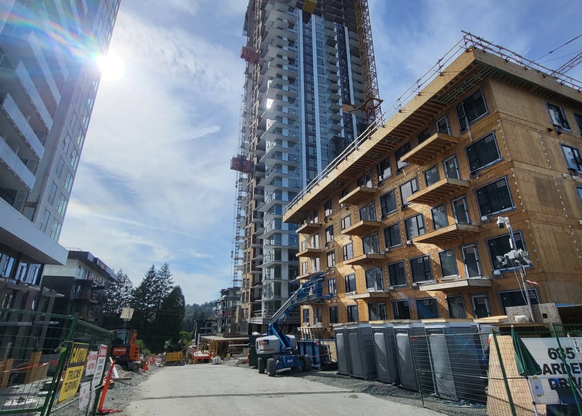 Construction site exterior with high-rise building under construction
